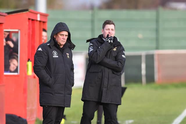 Frustrated Fareham Town boss Pete Stiles, left, watches on against AFC Stoneham Picture: Neil Marshall