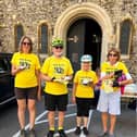 Mike Bridgman with others at last year's Ride and Stride, eating cake at St Luke's, Southsea