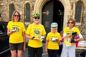 Mike Bridgman with others at last year's Ride and Stride, eating cake at St Luke's, Southsea