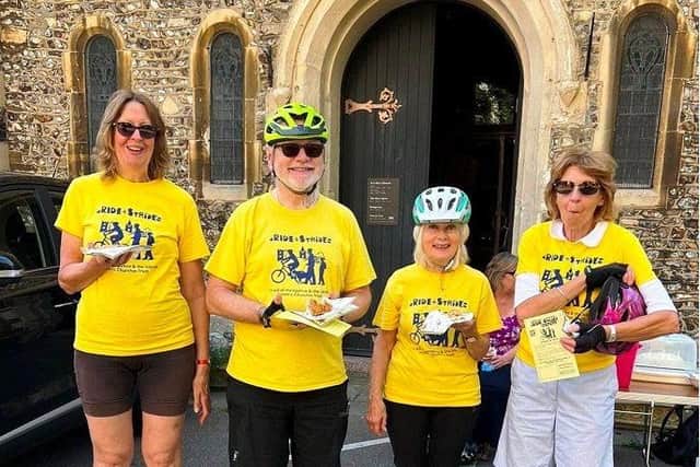 Mike Bridgman with others at last year's Ride and Stride, eating cake at St Luke's, Southsea
