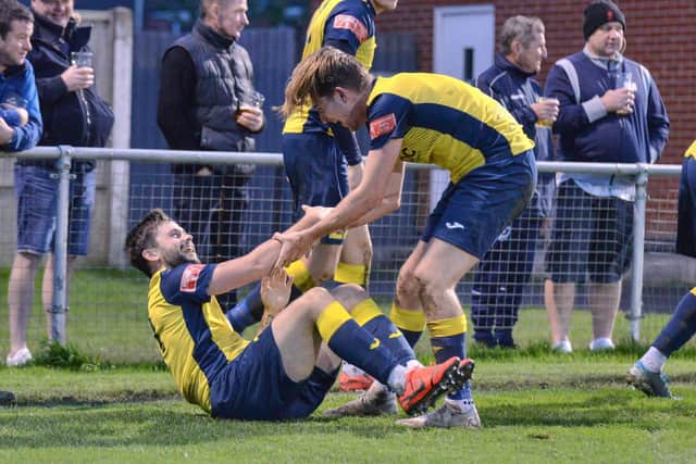 All smiles as Moneyfields celebrate one of their two  late goals that took them through to the first round of the FA Trophy for the first time. Picture: Martyn White.