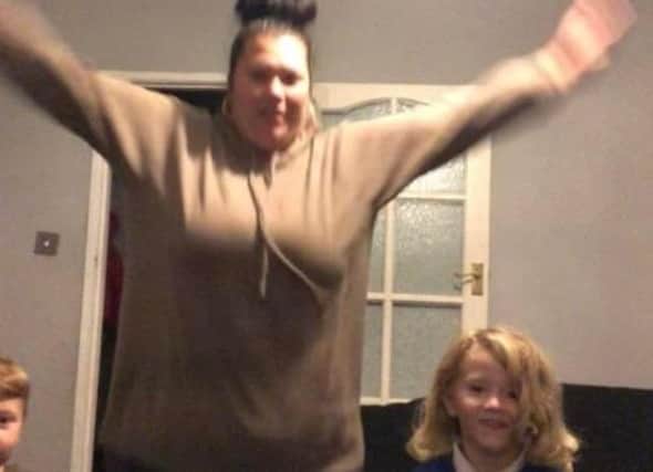 Sasha's twin sister Hannah doing her 100 star jump challenge with some of her children. Picture: Sasha Clarke.