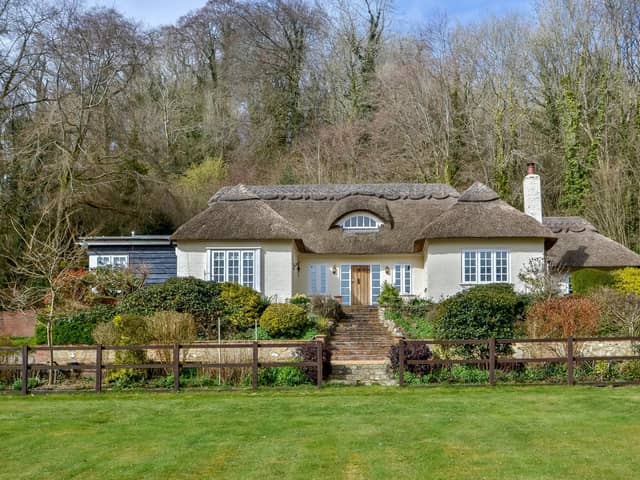 This four bedroom detached house in Hambledon is on sale for £1,895,000. It is listed by Fine and Country