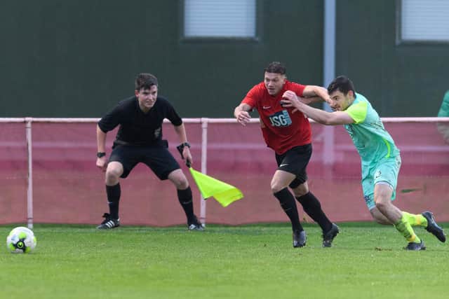 Josh Benfield (red) will again be one of Fareham Town's main source of goals in 2021/22. Picture: Keith Woodland