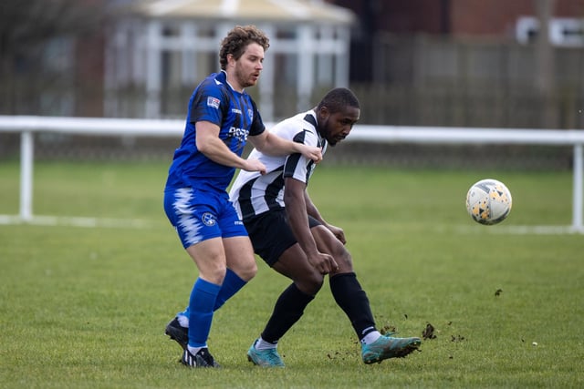 Hayling United (black/white) v Clanfield. Picture by Alex Shute