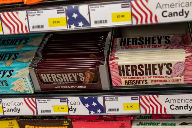 The Premier Shop stocks different kinds of Hershey chocolate bars, and they're on of Imityaz's best selling products. Picture: Mike Cooter (161221)