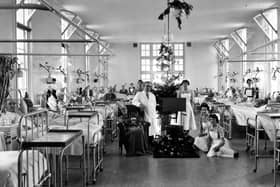 Deck the wards... Christmas 1949 on a men's ward at Queen Alexandra Hospital, Cosham.