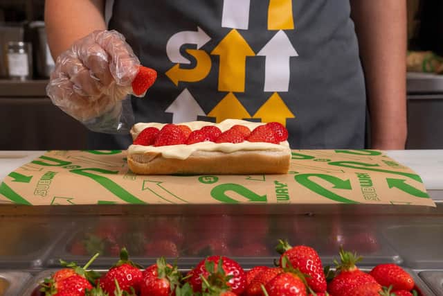 Limited edition strawberries & cream sub being prepared