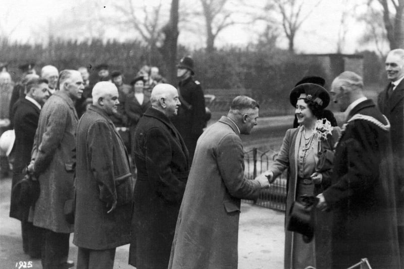 The Queen meets civic dignitaries during a visit to Portsmouth on September 30, 1942