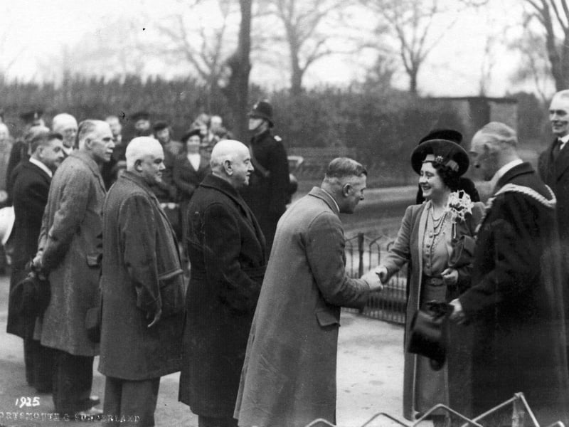 The Queen meets civic dignitaries during a visit to Portsmouth on September 30, 1942
