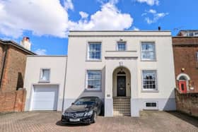 This property comes with six bedrooms, two bathrooms and three reception rooms as well as parking and a garden.