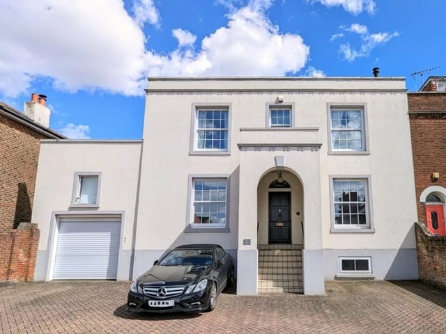 This property comes with six bedrooms, two bathrooms and three reception rooms as well as parking and a garden.
