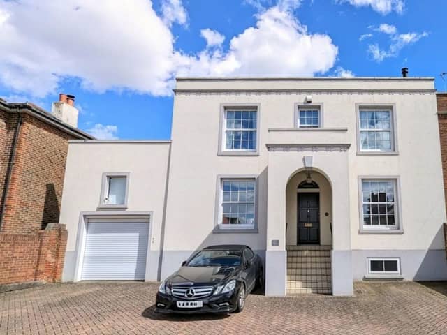This property comes with six bedrooms, two bathrooms and three reception rooms as well as parking and a garden.