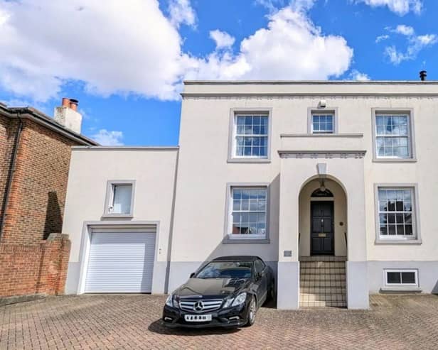 This property comes with six bedrooms, two bathrooms and three reception rooms as well as parking and a garden.
