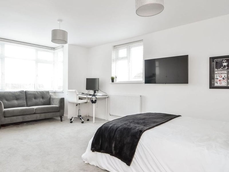 This property comes with five bedrooms, four reception rooms and three bathrooms.