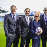 Pompey chairman Michael Eisner, second from right, with his family on a visit to Fratton Park last October.