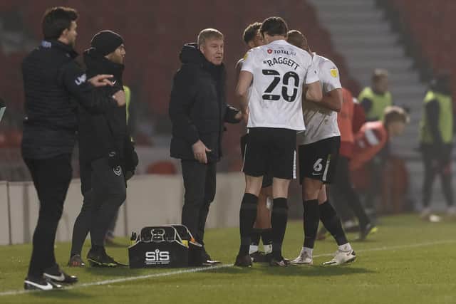 Kenny Jackett addresses some of his Pompey players during their 2-1 defeat at Doncaster. Picture: Daniel Chesterton/phcimages.com