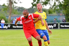 Scott Rendell, right, struck twice for Hawks