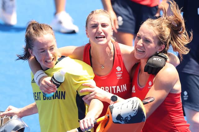 Goalkeeper Maddie Hinch, left, and team-mates Lily Owsley, centre, and Shona McCallin are overjoyed to have won Olympics bronze at Tokyo 2020. Picture: Alexander Hassenstein/Getty Images