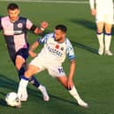 Hawks midfielder Billy Clifford, seen here in action against Dulwich Hamlet at the weekend, has been in the 'form of  his life' in recent weeks. Picture by Dave Haines