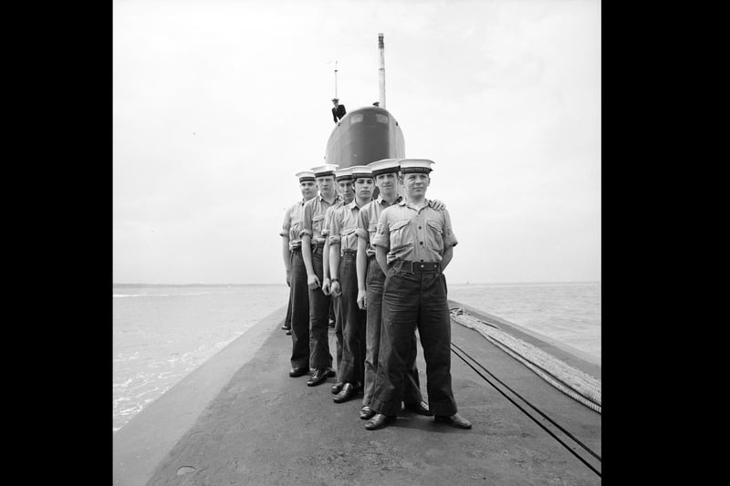 23rd May 1970:  Six Sea Cadets stand atop the Polaris submarine HMS Resolution while it docks in Portsmouth harbour.  (Photo by Central Press/Getty Images)
