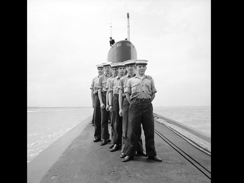 23rd May 1970:  Six Sea Cadets stand atop the Polaris submarine HMS Resolution while it docks in Portsmouth harbour.  (Photo by Central Press/Getty Images)