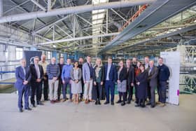 QinetiQ staff in Haslar, Gosport, celebrate the renwed contract with Gosport MP Caroline Dinenage. Picture: Contributed