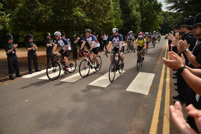 Hampshire Police officers and staff taking part in the Unity cycle race event, a 220-mile charity bike ride raising money for families of those who have died in the line of duty.