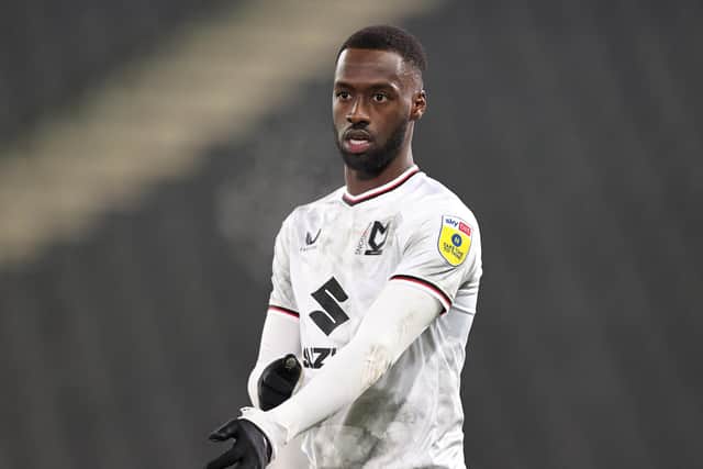 Former Pompey striker Mo Eisa is staying at MK Dons