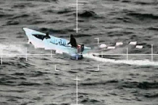 Pictured: The suspect's vessel photographed by the Wildcat from 815 Naval Air Squadron launched from RFA Argus during a successful drugs bust with the US Coast Guard in the Caribbean.