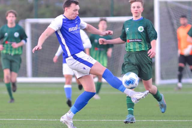 Denmead (blue/white) have put their application to join the Wessex League on hold for a year. Picture by Martyn White.