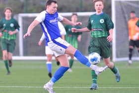 Denmead (blue/white) have put their application to join the Wessex League on hold for a year. Picture by Martyn White.