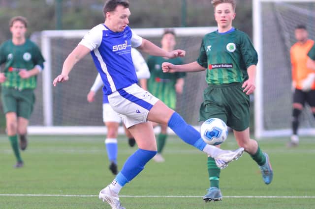 Denmead (blue/white) have put their application to join the Wessex League on hold for a year. Picture by Martyn White.