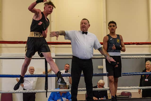 Troy Cook (Waterloovile Boxing Club) celebrates after being declared the winner of his bout against Jamal Franklin. Picture: Vernon Nash.