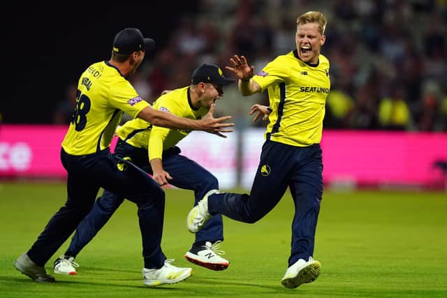 Nathan Ellis (right) celebrates after Hampshire's T20 final win. Picture by Mike Egerton/PA Wire.