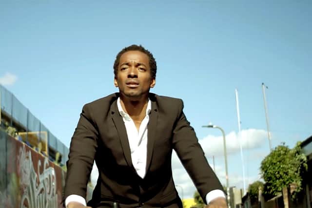 Aki  Omoshaybi in a scene from Real