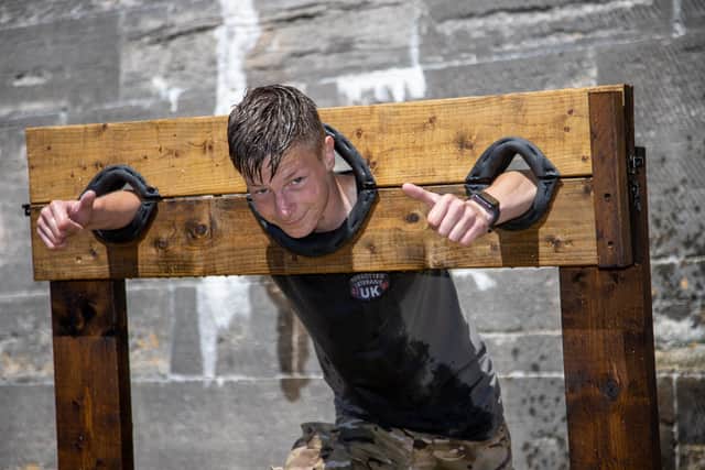 Joe Bartram 17, being soaked in the stocks at Fort Cumberland 

Photos by Alex Shute