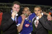 Nigel Quashie, centre, celebrates Pompey's Division One title triumph. Picture: Steve Reid