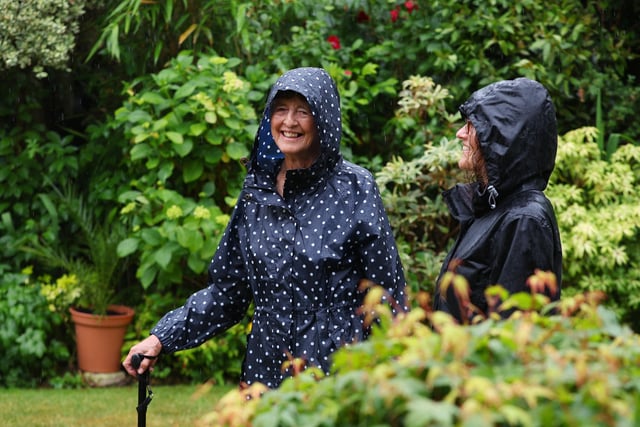 Visitors brave the wet Sunday afternoon weather as they tour the gardens.

Picture: Stuart Martin (220421-7042)