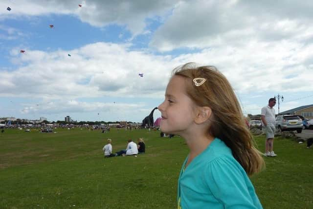 Families have shared some favourite photos of Luna Park, the Southsea dinosaur. Pictured: Dave Rodrigues showing the fun you can have with perspective