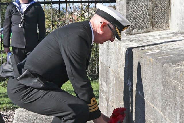 Commander Terry Tyack Royal Navy, Executive Officer, HMS Collingwood laying a wreath near the monument
Picture: Barry Zee