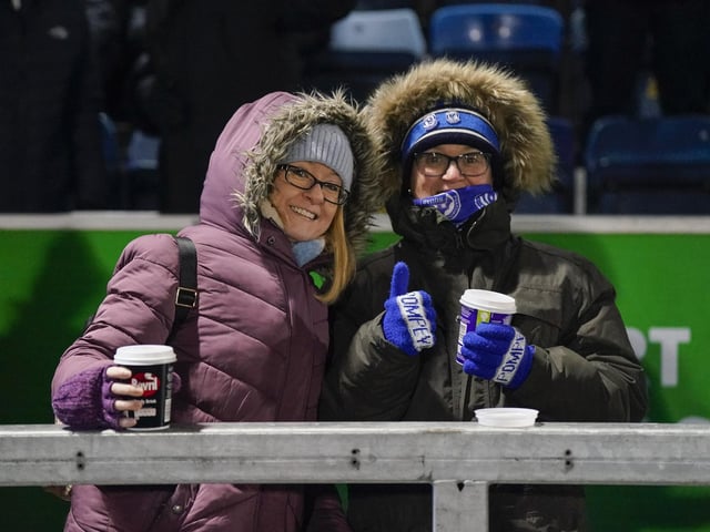 Pompey fans had to wrap up warm at Wycombe's Adams Park.