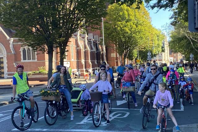 The cyclists take to the city's roads. 