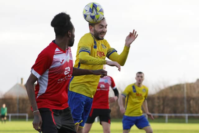 Meon's Ben Johns, right, v Eversley & California Reserves. Picture: Chris Moorhouse