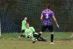 The Emsworth Town reserves goalkeeper saves a penalty during his team's 3-0 loss against Al's Bar in City of Portsmouth Sunday League Division Four. Picture: Kevin Shipp