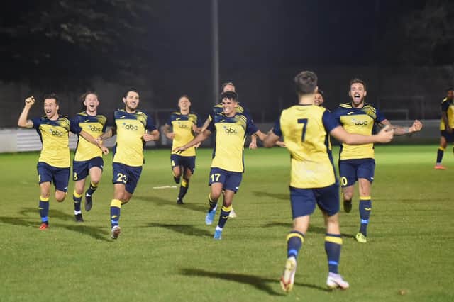 Moneyfields celebrate their FA Cup first qualifying round penalty shoot-out win at Aylesbury United - they will need to tighten up at the back if they are to spring an upset against Isthmian Premier high-fliers Cray Wanderers. Picture: Michael Snell.