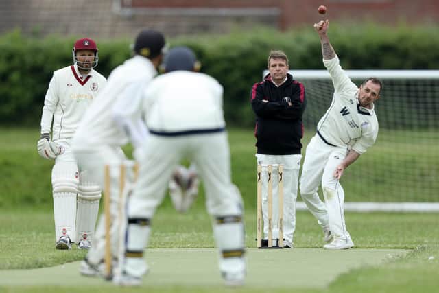 David Going bowling for Portsmouth Community. Picture: Chris Moorhouse