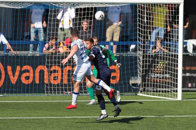 James Roberts heads Hawks into a 4-1 lead against Dover. Picture by Dave Haines