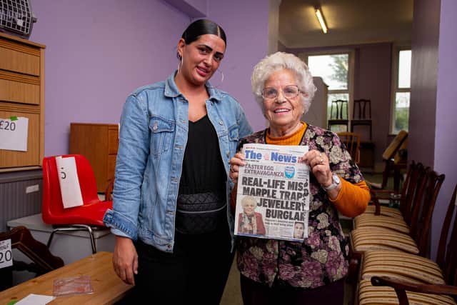 Nina Anderson with her granddaughter, Perri Colwell and a copy of The News when her home was burgled
Picture: Habibur Rahman