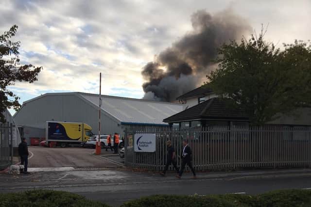 Fire crews and South Central Ambulance Service are in Airport Service Road in Copnor on October 13 after a fire at Portsmouth Aviation. Picture: Kev Parker
